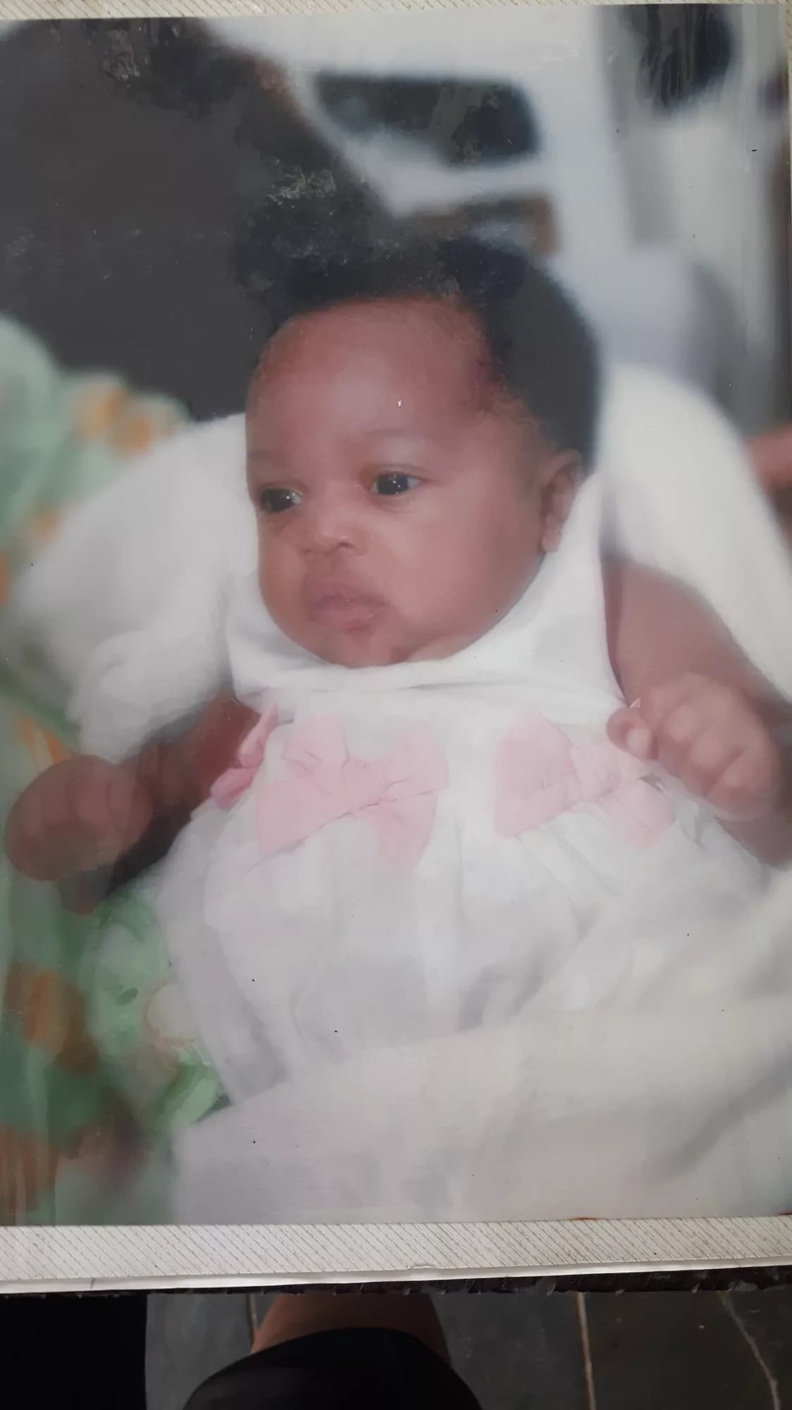 Baby Abigail looking toward the camera.