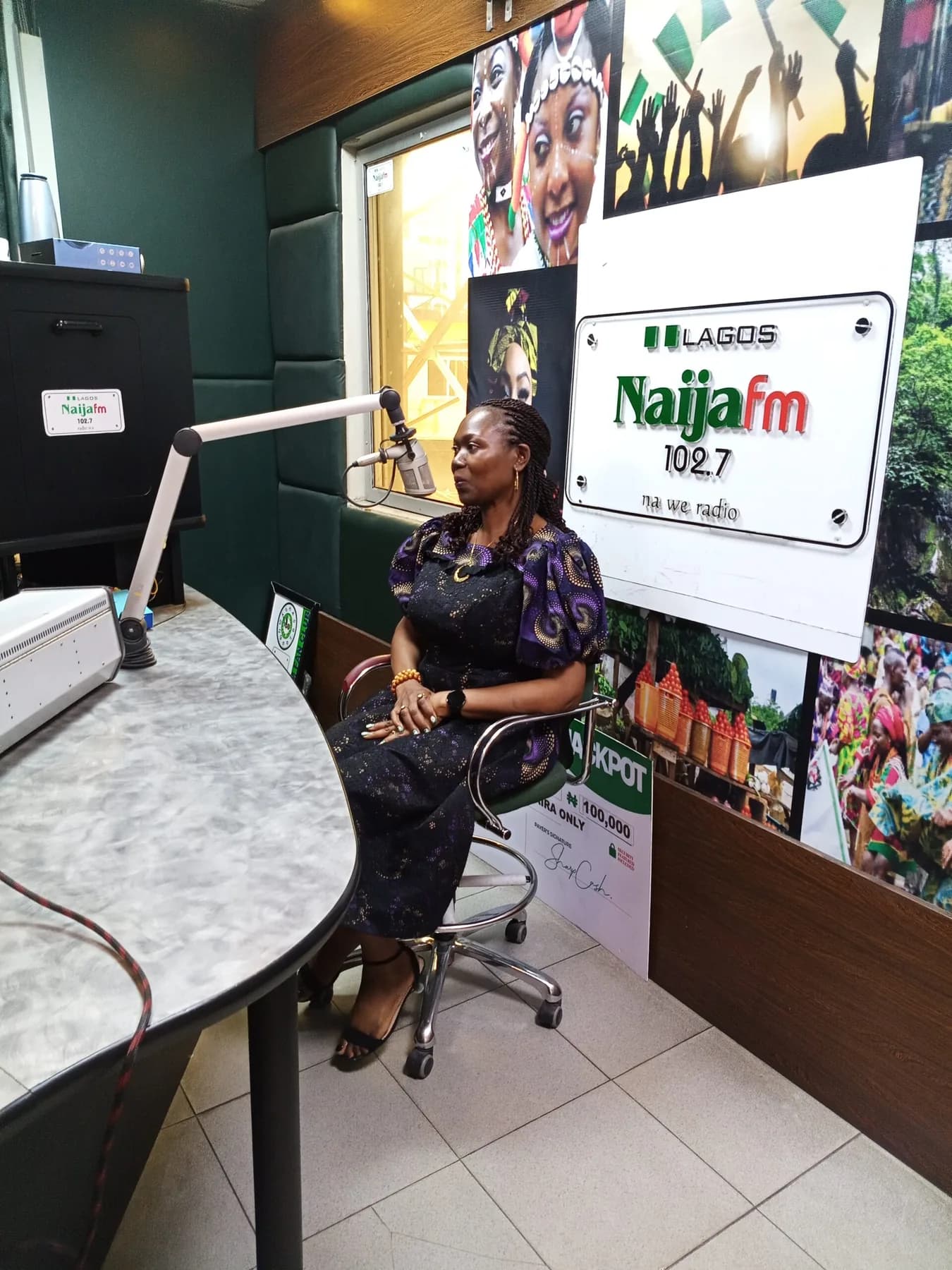 OAKonsult representative seated in a Naija FM studio