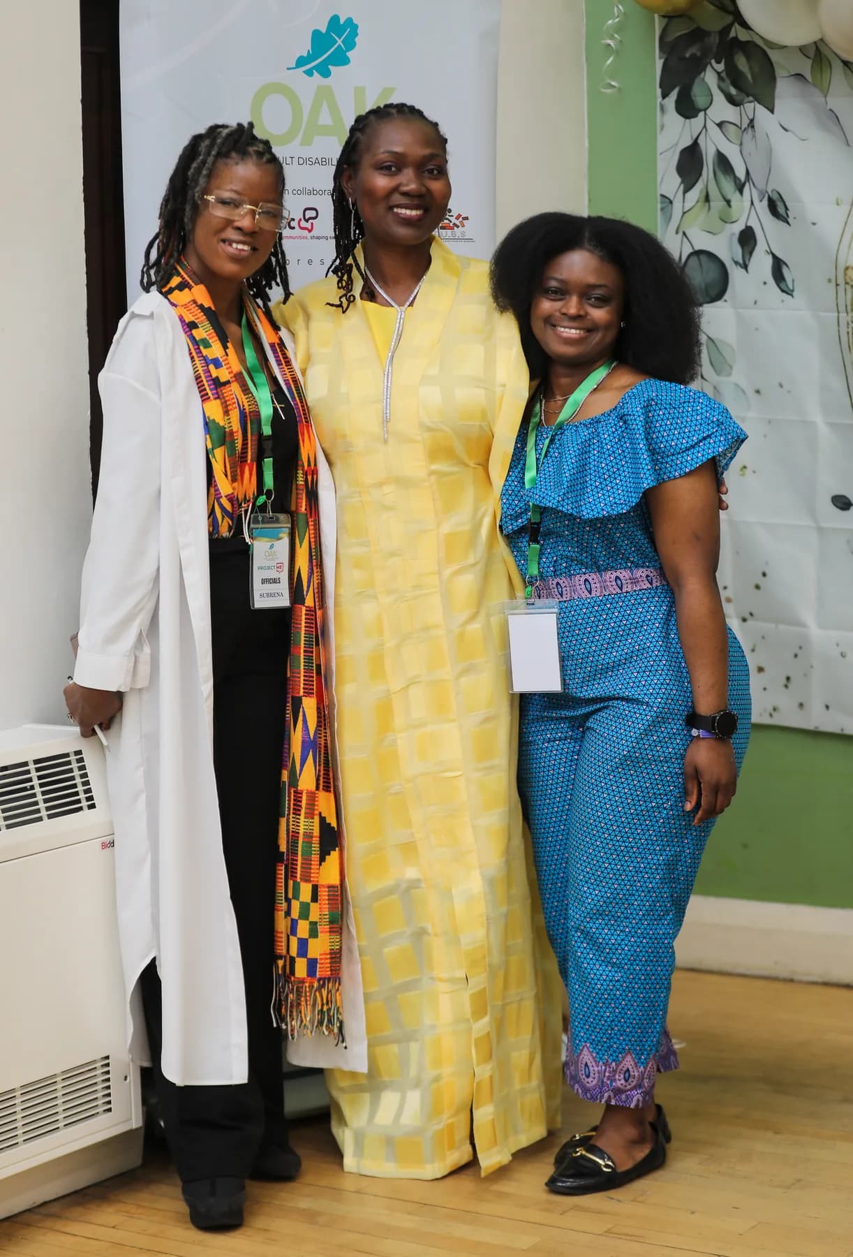 Three OAKonsult community partners smiling together