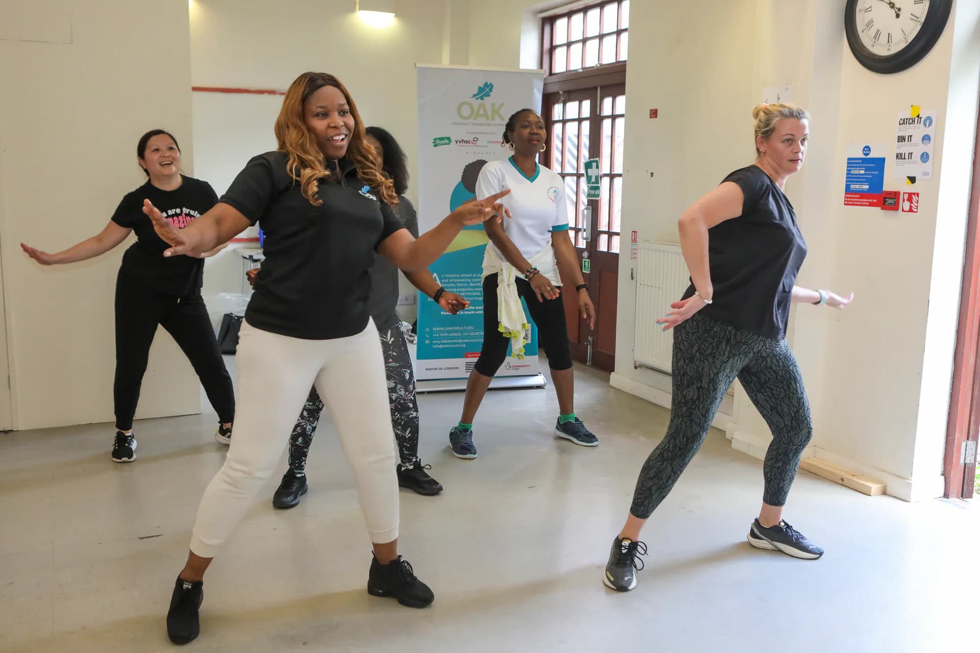 Parent carers taking part in a Zumba movement session